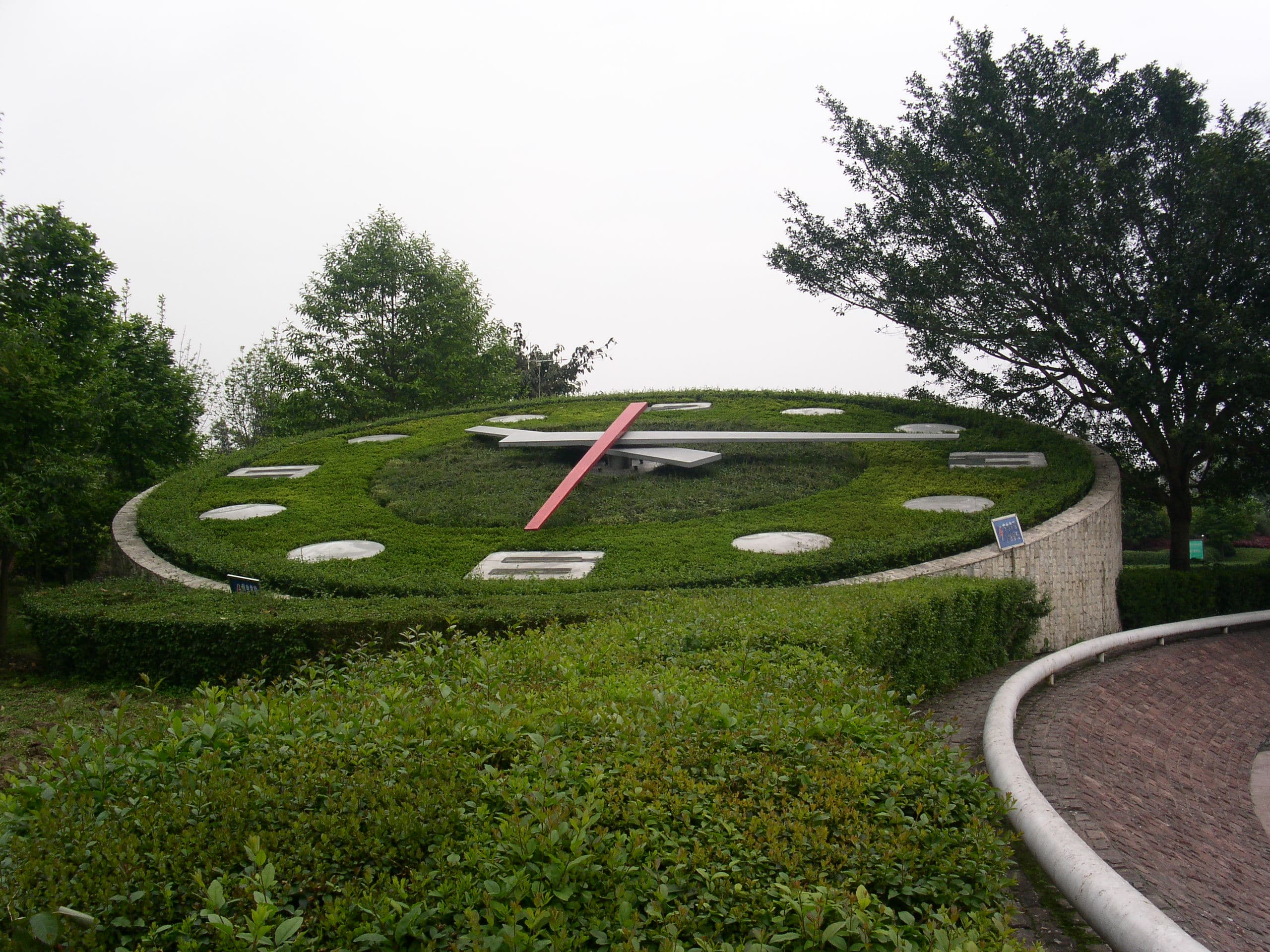 Floral clock installation in a school landscape.